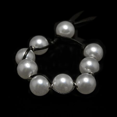 Handmade bracelet with big pearls and black leather