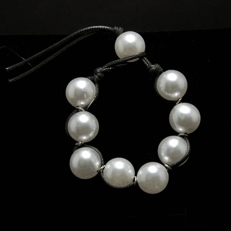 Handmade bracelet with big pearls and black leather