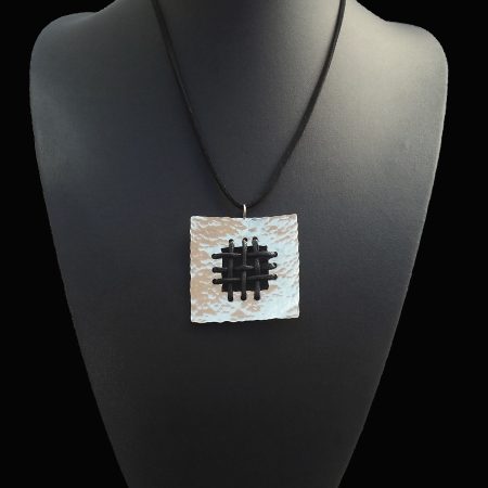 Handmade necklace with hammered arzanto [alpaca] and black leather!
