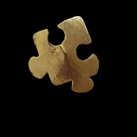 Handmade ring in plan puzzle piece with brass