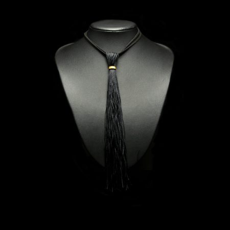 Handmade tassel pendant with black silk threads
