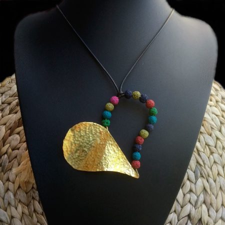 Handmade heart pendant with hammered brass and  volcanic stones!
