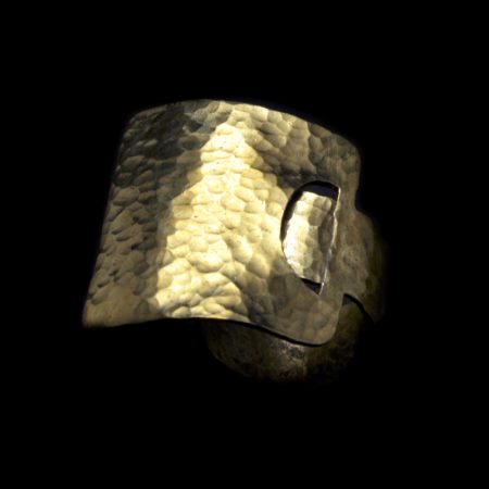 Handmade ring with hammered brass